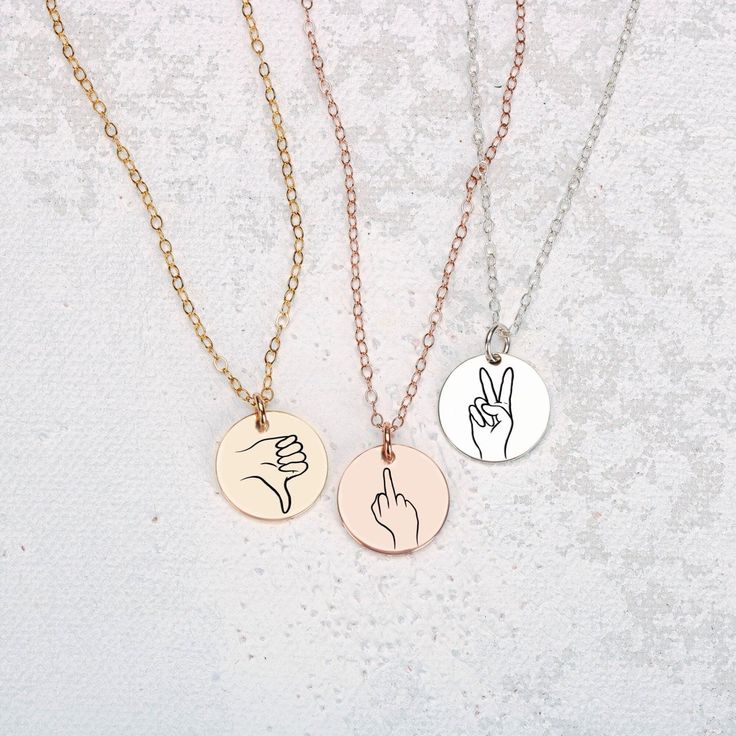 Treat your loved ones to something totally unique, totally creative, and totally YOU - the Hand Gestures Necklace. The perfect gift to let your friends and family know how much they truly mean to you! The coolest gift ever! Perfect for sharing your love with friends, sisters, and besties, our signature disc necklace features unique, hand-drawn expressions of sign language, designed by Melanie. Show your special someone just how much you care with a one-of-a-kind sign like 'I love you', 'peace', Drawn Expressions, Hand Gestures, 20 Inch Necklace, Like I Love You, Hand Gesture, Princess Necklace, Heart Face Shape, Month Gifts, Wear Necklaces