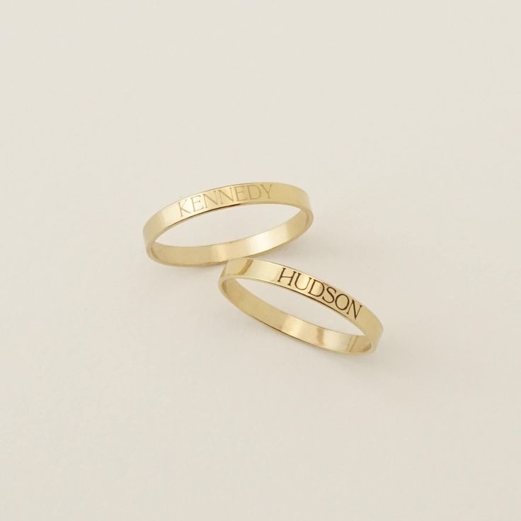 The Name of a Loved One, a Word or Phrase that means something to you, a Place, a Date, a Moment in Time... The Era Ring is perfect for carrying something or someone that means something to you close at hand and heart. ✨ They're stackable, but we suggest no more than Five Era Rings on one finger. Every piece is handcrafted with love in Charleston, SC, using 90% recycled and 100% ethically sourced raw materials from the USA-- a simple way to help make our planet a better place. Includes gift-ready packaging with a recycled cotton card printed with compostable inks, recycled tissue, and a linen drawstring back printed with compostable inks! MATERIALS: * GF = 14k Gold Fill * SS = Sterling Silver DETAILS: 2.25mm Band Width AT CHECKOUT: * If you need your piece sooner than our standard producti Ring With Name Engraved, 14k Gold Engraved Ring For Anniversary, Yellow Gold Engraved Ring For Promise, Adjustable 14k Gold Engraved Ring, Stamped 14k Round Band For Anniversary, Adjustable Yellow Gold Engraved Ring For Promise, Yellow Gold Engraved Promise Ring, Heirloom Style Yellow Gold Stackable Rings For Anniversary, Heirloom Yellow Gold Stackable Rings For Anniversary