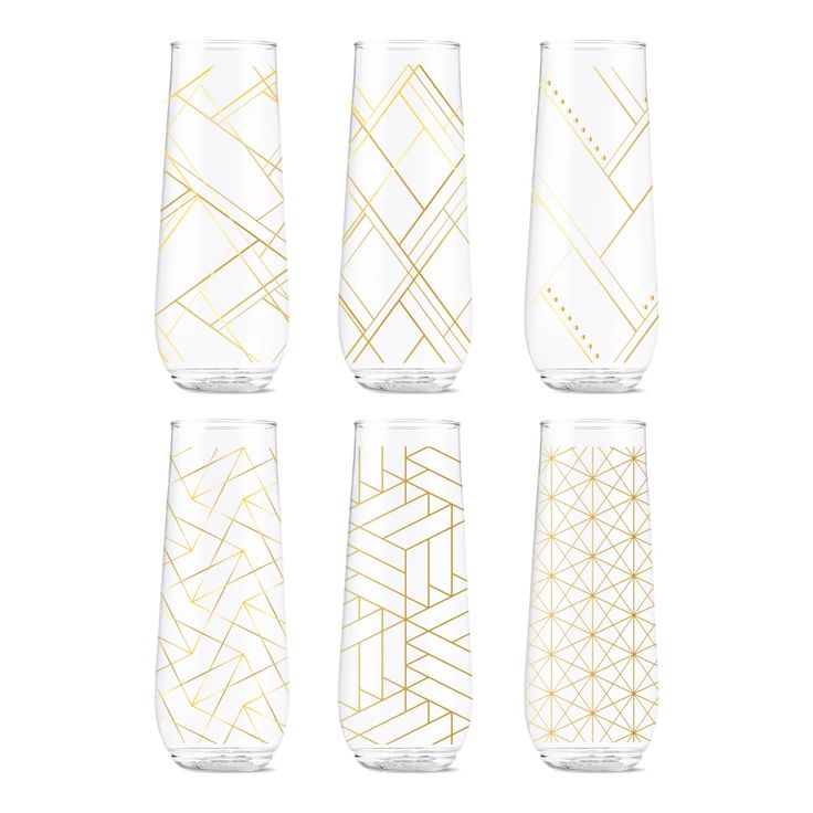 four glasses with gold lines on them