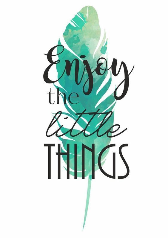 the words enjoy the little things written in black ink on a green watercolor background