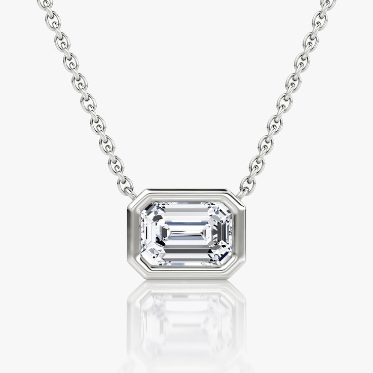 The Bezel Solitaire Necklace combines vintage-inspired detail and modern appeal together for a look that’s timelessly elegant. Timeless Platinum Jewelry In White Gold, Timeless White Gold And Platinum Jewelry, Timeless Platinum White Gold Jewelry, 14k White Gold Jewelry With Bezel Setting, Classic Pendant Diamond Necklace With Bezel Setting, Elegant Solitaire Pendant Necklace With Bezel Setting, Classic Platinum Diamond Necklace With Bezel Setting, Formal Diamond Jewelry With Smooth Bezel, Classic Silver Baguette Cut Diamond Necklace