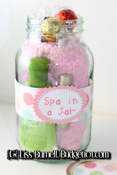 a jar filled with pink and green items