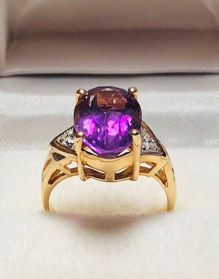 Beautiful Vintage 14k Yellow Gold Natural Amethyst Diamond Ring 100% Natural Amethyst Beautiful genuine Amethyst Amethyst 4.60CT Diamond(s) 0.06CT Color: G ]Clarity: SI1 Total ring weight: 4.6GR 14K Yellow Gold Ring sizing available Free of Charge For more information regarding this item feel free to reach me so I can accommodate your needs. Thank you Classic Amethyst Rings With Gemstone Accents, Purple Diamond Ring In 14k Gold, Formal Amethyst Birthstone Ring With Gemstone Accents, Purple Ring With Gemstone Accents For Formal Occasions, Oval Amethyst Ring Stamped 14k, Fine Jewelry Amethyst Ring With Accent Stones, Formal 14k Stamped Amethyst Ring, Fine Jewelry Purple Rings With Diamond Accents, Heirloom Purple Rings With Gemstone Accents