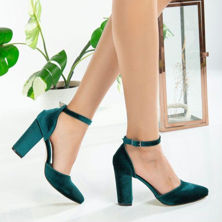 EMERALD WEDDING SHOES - GREEN BRIDAL SHOES - GREEN VELVET HEELS Introducing the epitome of elegance and comfort for your wedding day - the Green Velvet Wedding Heels from Belle Wedding Shoes. * With a graceful closed toe front and a secure ankle strap, these wedding high heels effortlessly blend sophistication with a touch of romance. The 4 inches (approximately 10 cm) green block heels elevate your stature, granting you an air of regal poise as you make your grand entrance. * Designed for the m Green Low Heel Court Shoes For Evening, Green Block Heels With Round Toe For Party, Green Block Heels With Round Toe For Evening, Green Round Toe Court Shoes With 4-inch Heel, Green Round Toe Block Heels For Evening, Green Closed Toe Evening Heels, Green Closed Toe Block Heels For Party, Green High Heel Wedding Shoes For Party, Green Round Toe Wedding Shoes