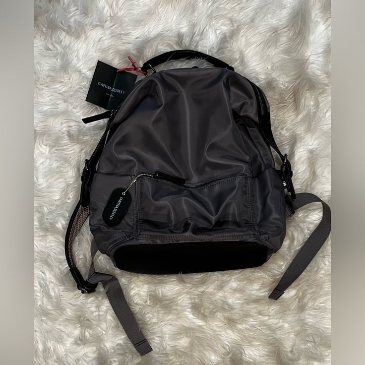 Nwt. Gray Backpack Trendy Gray Nylon Backpack, Gray Softback Backpack With Adjustable Strap, Gray Softback Travel Backpack, Modern Gray Standard Backpack, Gray Standard Backpack, Gray Nylon Backpack With Adjustable Strap, Gray Backpack With Adjustable Strap, Outdoor Gray Backpack With Adjustable Strap, Gray Backpack