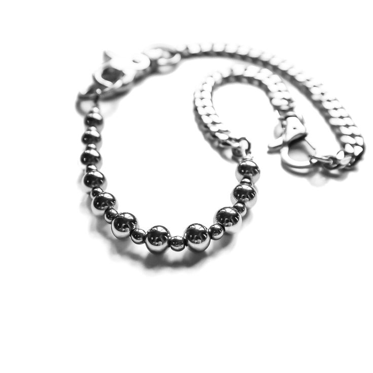 Power up your look with this daring grunge necklace. Hand strung stainless steel beads and cable chain provide texture and depth. An adjustable swivel clasp closure ensures you get the perfect fit. Take risks with your fashion and make a bold statement with this Komet necklace. 21 inches full length, adjustable down to 14 inches stainless steel stone spacers adjustable swivel clasp Everyday Stainless Steel Chain Bracelet With Adjustable Chain, Everyday Stainless Steel Adjustable Chain Bracelet, Silver Adjustable Chain Necklace For Streetwear, Silver Chain Necklace With Adjustable Chain For Streetwear, Silver Chain Necklace For Streetwear With Adjustable Chain, Stainless Steel Snake Chain Jewelry, Modern Gunmetal Chain Bracelet, Everyday Silver Chain Metal Bracelet, Metal Chain Necklace For Everyday Use