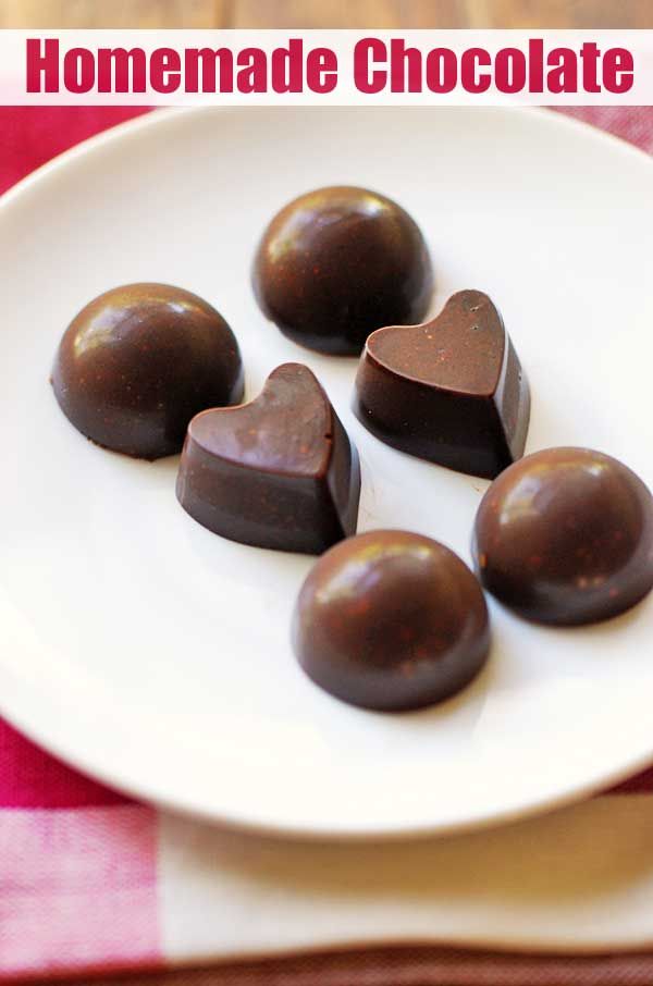 chocolate hearts on a plate with the words homemade chocolate