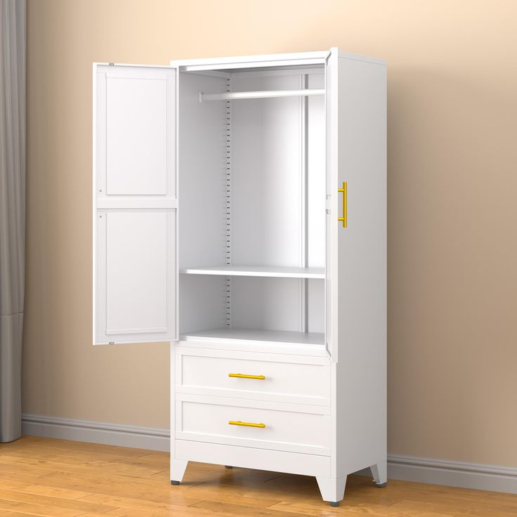 a white armoire with two drawers and a yellow handle on the bottom drawer in a room