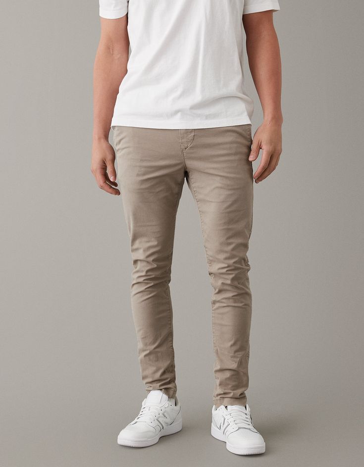 Flex/Flex is durable and designed to give you just enough stretch to move with no problem/Comfortable and never loses its shape/Soft, structured fabric/Specifically washed for a lived-in look Slim Fit Casual Bottoms With Standard Cut Leg, Casual Fitted Khaki Chinos, Stretch Neutral Color Bottoms, Relaxed Fit Khaki Chino Cotton Twill Bottoms, Casual Chino Cotton Twill Bottoms With Standard Cut Leg, Casual Slim Fit Beige Pants, Beige Chino Cotton Twill Trousers, Casual Beige Elastane Pants, Neutral Stretch Bottoms With Elastic Waistband