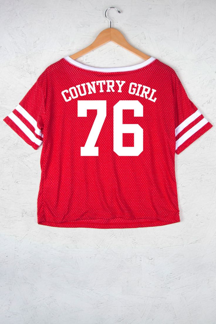 Country Girl Store - Women's Country Girl® Meshy Burnout Cropped V-Neck Tee, $33.95 (http://www.countrygirlstore.com/womens/short-sleeve-tees/country-girl-meshy-burnout-cropped-v-neck-tee/) Graphic Tee T-shirt With Team Name For Summer, Graphic Tee T-shirt For Cheerleading, Crew Neck T-shirt With Sublimation Print For Cheerleading, Trendy Red T-shirt For College, Summer Graphic Tee With Team Name, Trendy Graphic Print Tops For Sports Season, Trendy Sports Season Graphic Print Tops, Short Sleeve T-shirt For Summer Cheerleading, Red Tops With Text Print For Sports Events