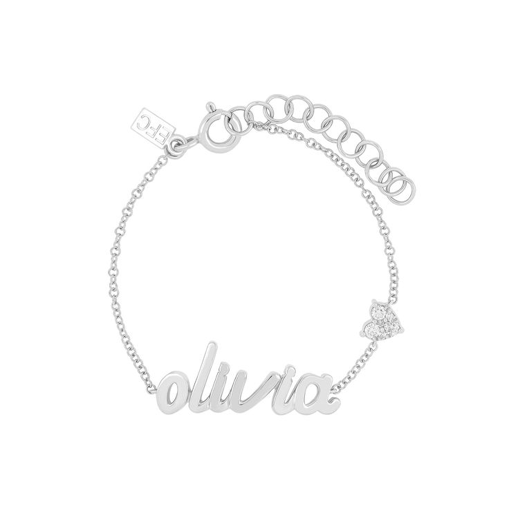 The You Have My Heart Script Name Bracelet was originally created to welcome Emily's beautiful baby girl, Olivia. Featuring your choice of 1-10 gold script letters and our signature heart motif with full-cut diamonds, this custom, one-of-a-kind bracelet comes in two sizes for either baby or mama. Dainty Sterling Silver Custom Name Bracelet, Personalized White Gold Bracelet, Elegant Personalized Charm Bracelet With Nameplate, Dainty Engraved Name Bracelet For Personalized Gift, Elegant Personalized Nameplate Charm Bracelet, Dainty Sterling Silver Name Bracelet For Mother's Day, Engraved Sterling Silver Name Bracelet For Mother's Day, Personalized Dainty White Gold Name Bracelet, Personalized White Gold Name Bracelet As Gift