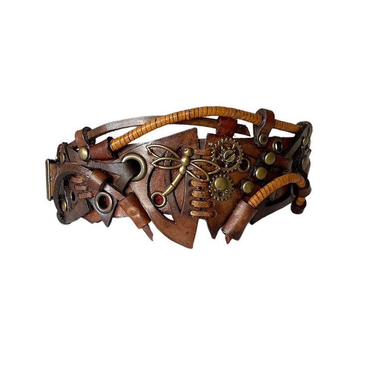 This vintage brown steampunk leather bracelet with a metal dragonfly can be a perfect jewelry gift for men or women. The bracelet is totally handcrafted and carved by hand. That's why it is really a unique piece of art. Each cuff in my shop is made of genuine leather and decorated with metal parts. Bracelet's width is about 2.2 in (5.5 cm) Bracelet's length is about 7.9 in (20 cm) It is adjustable and fits the wrist 6.7-7.9 in (17-20 cm) Please measure your wrist to make the correct choice  IMPORTANT - since it's a handmade item there might be slight variations in the design, however, the general idea and impression will be preserved. CARE No special care is required. Avoid chemical exposure including perfumery. If you need a custom order please let me know and I will try to do my best to Adjustable Brown Metal Cuff Bracelet, Steampunk Leather Bracelet As A Gift, Steampunk Leather Bracelet Perfect As A Gift, Steampunk Brown Jewelry For Gifts, Steampunk Brown Jewelry Gift, Steampunk Brown Jewelry For Gift, Brown Metal Bracelets For Festival, Brown Steampunk Jewelry Gift, Brown Metal Bracelets For Festivals