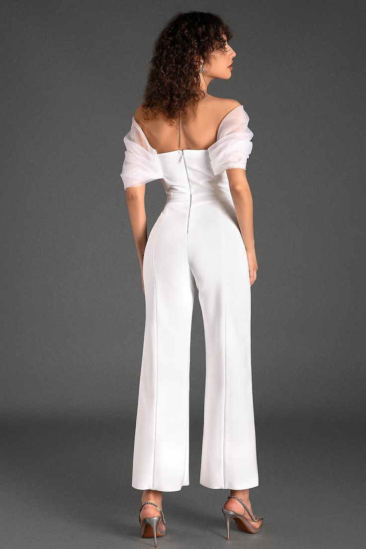 Channel your inner glamour with our off-shoulder patchwork bandage jumpsuit. This stunning piece features an exquisite off-shoulder design, highlighted by elegant white organza that wraps around your arms, adding a touch of ethereal charm. The intricate patchwork and body-hugging bandage material accentuate your curves, enhancing your allure effortlessly. Perfect for upscale events, glamorous parties, and chic date nights. Handmade customization Fabric composition: 90% polyester fiber, 10% spand Elegant Summer Jumpsuits And Rompers For Banquets, Elegant Summer Jumpsuits And Rompers For Banquet, White Off-shoulder Jumpsuits And Rompers For Evening, White Off-shoulder Evening Jumpsuits And Rompers, Elegant White Strapless Jumpsuit For Evening, White Strapless Jumpsuit For Evening, Elegant White Strapless Jumpsuit For Party, White Off-shoulder Jumpsuit For Party, Elegant Jumpsuits And Rompers With Sheer Sleeves For Evening