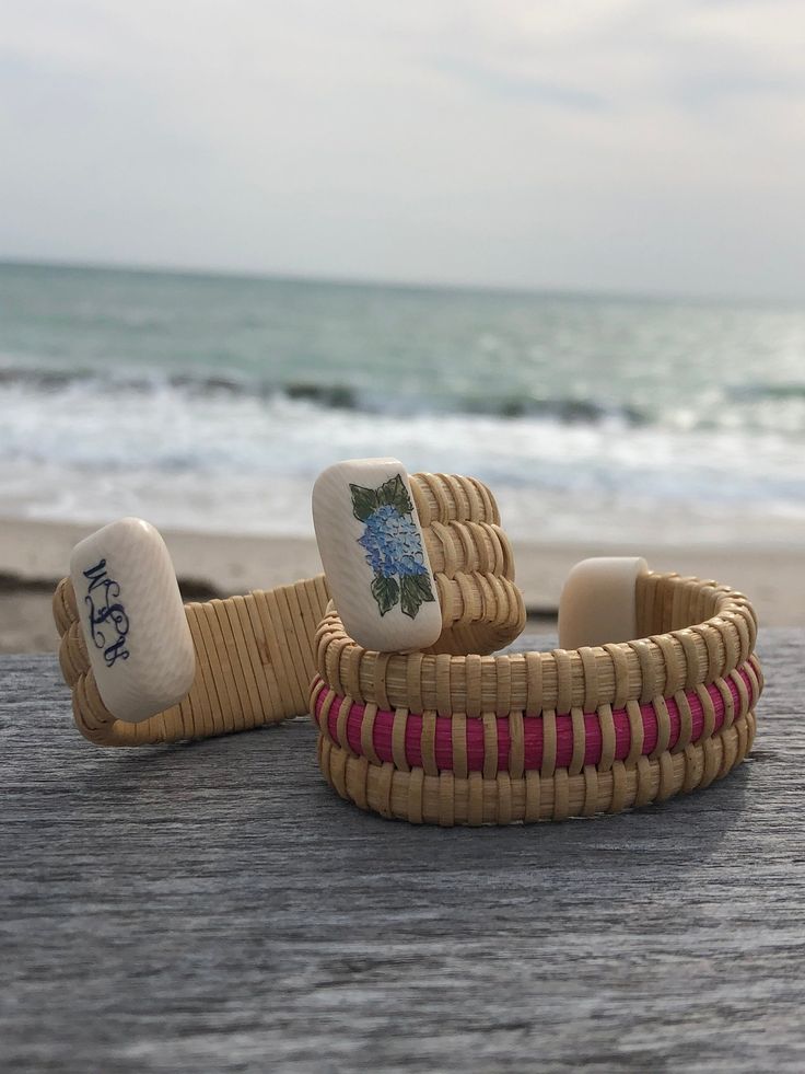 3/4” Nantucket bracelets made in the Lightship basket weaving style. Natural cane and weavers with Acrylic end caps.Color choices are beach rose pink, sea foam, hot pink, purple or teal.Price includes shipping and bracelet gift box. For orders of 3+ bracelets, please contact me for discounted pricing.Sizing - (Measurements from end to end and are approximate)Extra Small - 4 3/4"Small - 5 1/4"Materials: cane,weaver Woven Braided Bracelets For Beach In Summer, Summer Beach Braided Woven Bracelets, Summer Vacation Woven Bracelets, Pink Woven Bracelet For Summer, Lightship Basket, Beach Rose, Bracelet Gift Box, Pink Sea, Nantucket