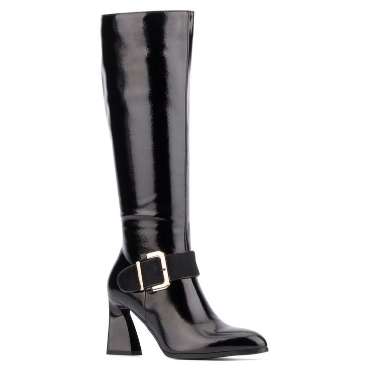 Introducing our chic Abrianna boot with a captivating buckle detail, a perfect fusion of style and sophistication. These boots feature a sleek silhouette complemented by a striking buckle accent. The sturdy heel adds a touch of allure, making them ideal for both casual outings and special occasions. Step into timeless elegance with our stylish boot. Elegant Fitted Knee-high Boots With Buckle Closure, Chic High Ankle Moto Boots For Workwear, Formal Heeled Boots With Buckle Closure And Block Heel, Formal Block Heel Boots With Buckle, Elegant Fall Boots With Buckle Closure, Workwear Knee-high Boots With Buckle Closure, Fitted Office Boots With Buckle Closure, Winter Workwear Boots With Buckle Closure, Block Heel Boots With Buckle Closure In Medium Width