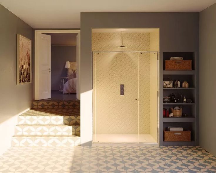 a bathroom with a walk in shower sitting next to a white door and shelves on the wall