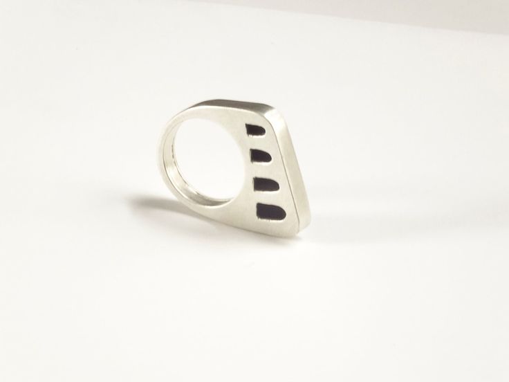 Everyone should have at least one silver statement ring in their jewelry collection. This architectural ring is hand fabricated with sterling silver and has a lovely minimalist style. Great for everyday and gift giving. Materials: sterling silver Finish: It has a satin finish Band width: approximately 3/8 inches Available sizes: US 6-14 Fabrication 1-2 weeks fabrication time Shipping: Free shipping within the US Looking for other statement rings? you can find them here https://www.etsy.com/shop/ Modern Handmade Sterling Silver Rings, Modern Sterling Silver Rings With Unique Design, Modern Sterling Silver Ring With Unique Design, Modern Hand Cast White Gold Ring, Contemporary Sterling Silver Rings For Gifts, Contemporary Sterling Silver Rings As Gift, Contemporary Rings With Unique Design For Gift, Modern Silver Rings, Contemporary Silver Ring With Unique Design