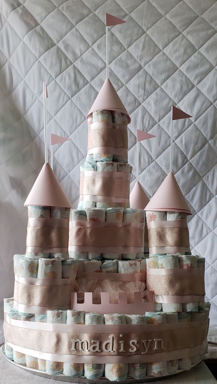 Castle Diaper Cake Diaper Castle Cake, Disney Castle Baby Shower, Princess Diaper Cake Ideas, Disney Themed Baby Shower Ideas Girl, Disney Baby Shower Cake, Sleeping Beauty Baby Shower Theme, Babyland Shower Theme, Disney Princess Baby Shower Ideas, Disneyland Cake