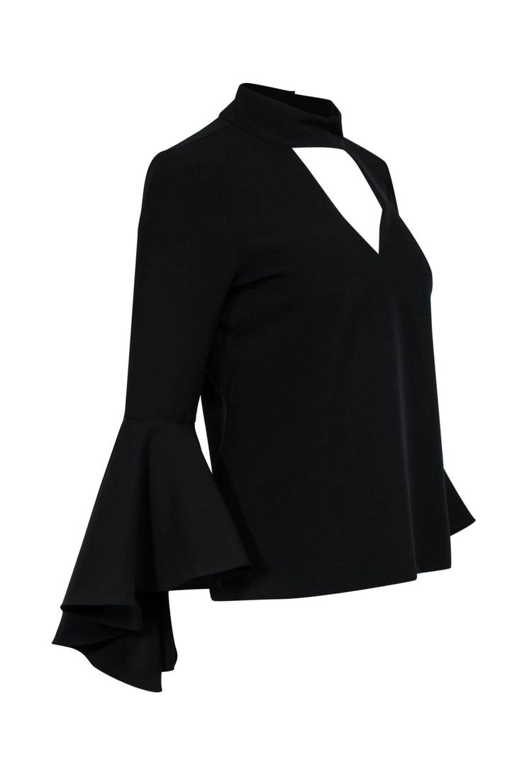 Step aside basic blouses -- this top from Milly is here to vamp up your wardrobe! Bell sleeves and a chic cutout adorn this sleek blouse. Perfect for your next brunch! Pair with skinny jeans and a wide brim hat for an Insta-worthy look. Size 4 Shell: 90% Polyester, 10% Spandex Lining: 100% Polyester Made in USA Concealed back zipper Buttons on back of collar Lined High neckline w/ cutout in front and back Long, bell sleeves Bust 38" Waist 35" Sleeve length 25" Shoulder to hem 24" Chic V-neck Long Sleeve Top For Night Out, Elastane Tops For Night Out In Fall, Sleek V-neck Tops For Spring, Sleek V-neck Party Blouse, Modern Stretch Tops For Party, Sleek Long Sleeve Top For Evening, Night Out Cutout Tops, Fall Elastane Blouse, Cutout Tops For Night Out