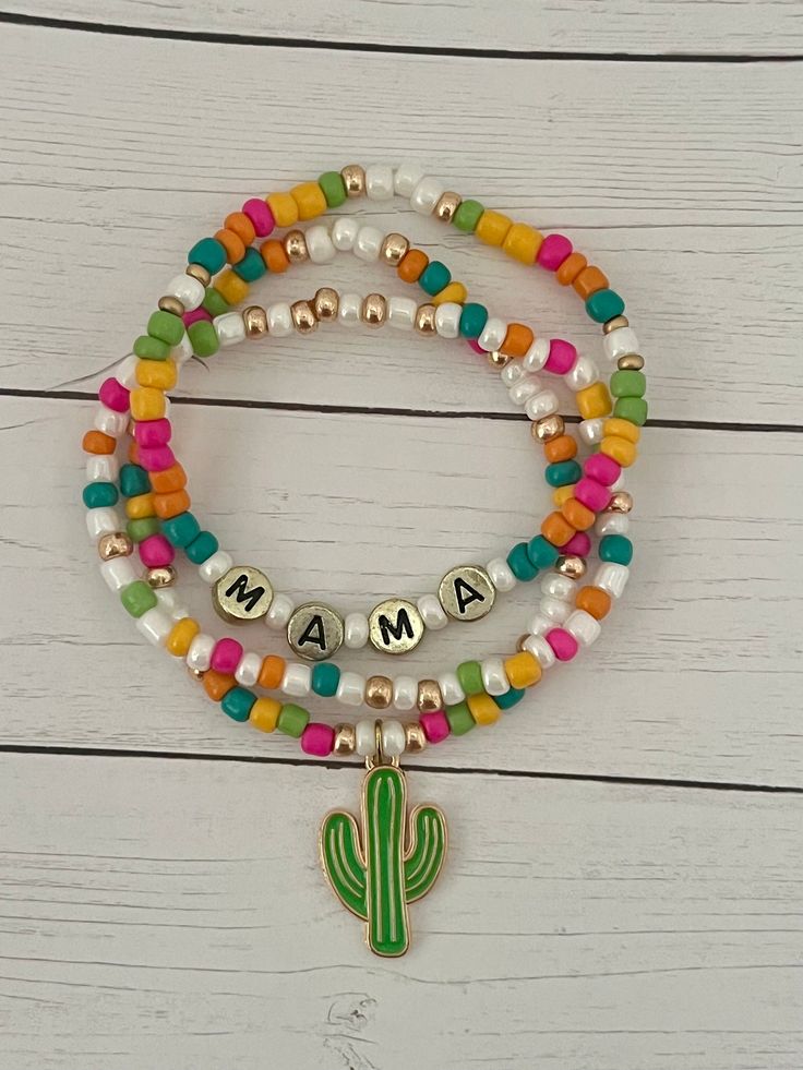 Celebrate being a mama, grandma, or abuela with these Mexican fiesta themed friendship bracelet sets! Great for a baby shower or fiesta themed party!  Bracelet sets come in a standard 7 in size unless another size is requested in personalization notes. Other options are 6, 6.5, 7.5, and 7.75 inches in diameter. Playful Multicolor Jewelry For Mother's Day, Personalized Multicolor Friendship Bracelets For Birthday, Personalized Pink Bohemian Friendship Bracelets, Playful Bracelets For Birthday And Mother's Day, Personalized Multicolor Bohemian Friendship Bracelets, Personalized Green Bohemian Bracelets, Personalized Bohemian Beaded Bracelets For Mother's Day, Fun Handmade Jewelry For Mother's Day, Playful Multicolor Beaded Bracelets For Mother's Day