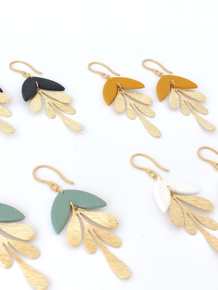 LEAF * GOLD * EARRINGS Handmade, polymer clay earrings with gold leaf and personalized colors, 18K gold plated. A bright, colorful eye-catcher, in Art Deco style. Lightweight, have stainless steel 18K Gold Plated posts (Hypoallergenic, safe for sensitive skin). Each piece is handmade and one of a kind! Perfect for any occasion, for you or as a gift for the one you loves! SIZE: 2.6 in (6,7 cm) height HOW TO ORDER: You can choose the color you like best in the drop down menu, look at the latest ph Gold Polymer Clay Jewelry For Everyday, Everyday Gold Polymer Clay Jewelry, Gold Polymer Clay Dangle Jewelry, Nickel Free Gold Polymer Clay Jewelry, Gold Dangle Earrings In Polymer Clay, Nickel-free Gold Polymer Clay Jewelry, Gold Polymer Clay Dangle Earrings, Minimalist Gold Polymer Clay Jewelry, Leaf Clay Earrings