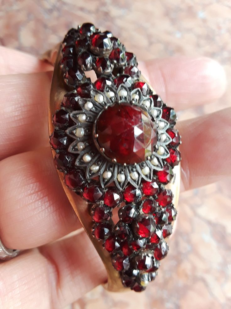 Absolutely Beautiful Georgian/ Victorian Bohemian Garnet Seed Pearl Bangle Bracelet... Very Good Antique Condition for the age. one small dent...look pics. All sales are final... Victorian Jeweled Bracelets For Formal Occasions, Victorian Bracelet With 17 Jewels For Gift, Victorian Jubilee Bracelet For Anniversary, Antique Jeweled Bracelets As Gift, Ornate Jeweled Bracelets As Gift, Ornate Jeweled Bracelets For Gifts, Antique Gemstone Bracelet For Gift, Antique Round Gemstone Bracelets, Antique Gemstone Bracelets