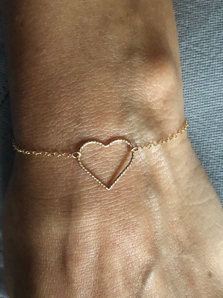 A cute bracelet with a heart charm to show yourself a little love, or maybe gift to a lucky lady in your life (family, friend or that special some one). Description: - Yellow Gold-filled Cable Chain, Heart Charm and Spring Ring Clasp. - 7 inches in length - Adjustable up to 9 inches (by request for an additional cost) Heart Bracelet For Best Friend And Mother's Day, Heart Bracelet For Mother's Day And Best Friend Gift, Double Heart Charm Jewelry For Best Friend, Heart Charm Double Heart Jewelry For Best Friend, Elegant Heart Charm Bracelet For Friendship, Minimalist Jewelry For Friendship On Valentine's Day, Minimalist Bracelets For Best Friend Valentine's Day Gift, Personalized Heart Bracelet For Friendship, Heart Shaped Jewelry For Best Friend