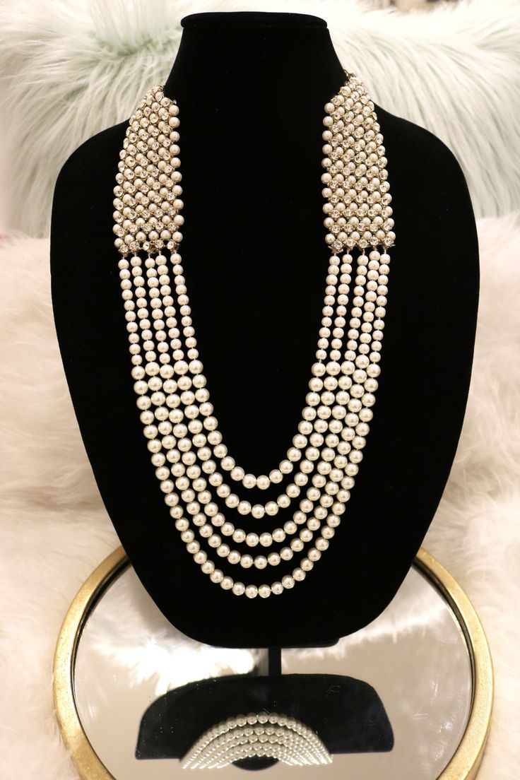 Handcrafted with love to give a real traditional look for this set beautifully studded with stones and pearls give a royal look. Includes: Rani Haar, Earrings, and Tikka Elegant Pearl Necklace With Silver Beads For Wedding, Classic Polished Pearl Necklace For Wedding, Formal Pearl Jewelry With Silver Beads, Classic Wedding Pearl Necklace With Polished Beads, Pearl Jewelry With Silver Beads, Elegant Pearl Necklace With Polished Beads For Wedding, Festive Formal Pearl Chain Necklace, Elegant Party Jewelry With Pearl Buttons, Pearl Necklace For Celebrations