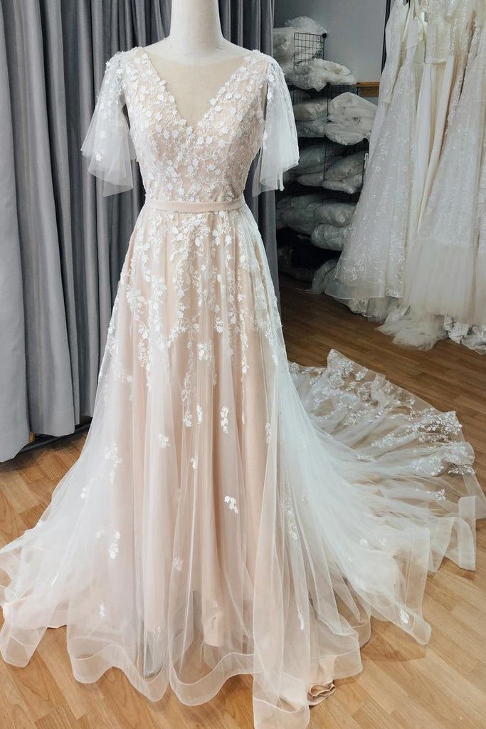 a wedding dress on display in a store