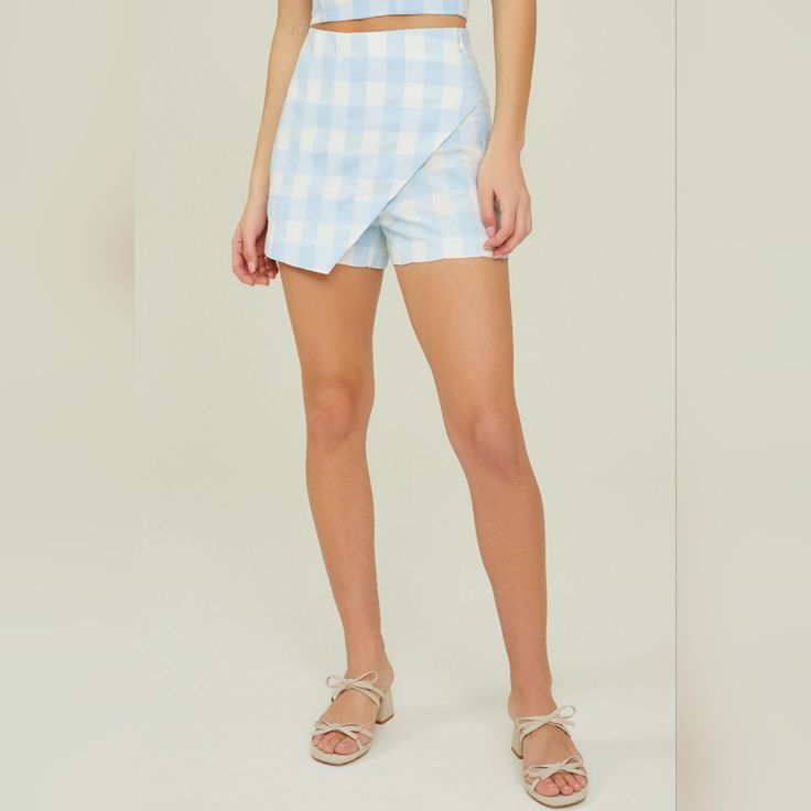 Nwt Altar'd State Sallie Gingham Skort Color: Light Blue Size Small Product Information Glam In Gingham, This Skort Features An Asymmetrical Skirt Overlay With A Double Back Pocket And Zipper Closure. Fit: Fitted Closure: Zipper Imported Plaid Beach Bottoms For Spring, Plaid Bottoms For Beach In Spring, Spring Vacation Gingham Bottoms, Spring Plaid High Waist Skort, High Waist Plaid Skort For Spring, Plaid Bottoms For Spring Vacation, Spring Vacation Plaid Bottoms, Plaid Short Skort For Spring, Plaid Cotton Skort For Summer