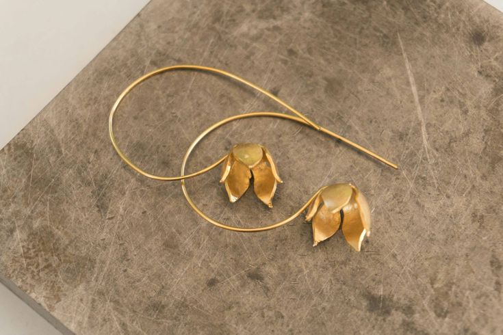 Drop gold blooming flower earrings. Designer delicate dangle earring. wedding jewelry. Romantic gift for her. everyday minimalist. This is a gold plated earrings. It is a blooming flower dangle earrings, a small delicate minimalist earrings that can be worn every day. It is a beautiful piece perfect for giving to a special someone or as a gift or to yourself. Its a great gift for sister, graduation, bridesmaid gifts, girlfriend, good friends, mother gift for all seasons. All my gold plated earri Brass Flower Earrings For Wedding, Flower Shaped Brass Wedding Earrings, Delicate Drop Flower Earrings For Bridesmaid Gift, Flower-shaped Brass Wedding Earrings, Delicate Flower Earrings For Bridesmaid Gift, Elegant Flower Shaped Brass Earrings, Delicate Gold Brass Flower Earrings, Elegant Brass Flower Earrings, Gold Dangle Flower Earrings For Bridesmaids