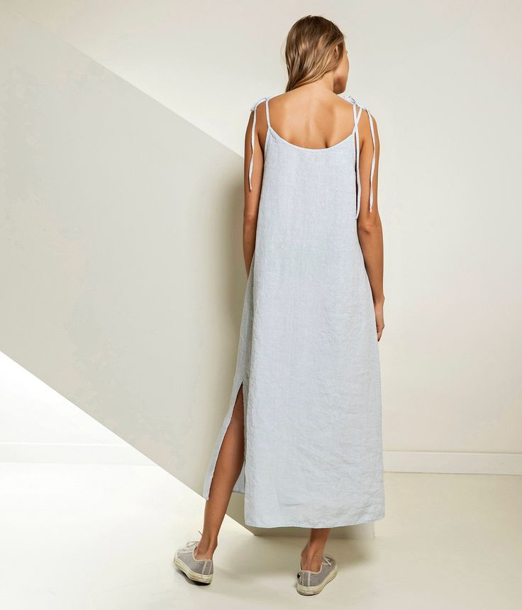 "Light summer slip dress, cami-dress from linen. Fluttering A-line silhouette and elegant front pleat turn this simply minimalistic dress into the the playful outfit. Emphasize your mood and style by selecting from 40 colours palette. Nothing welcomes the warmer months quite as well as a linen dress. It's a must-have for your hot summer. Double washed for extra softness and shrinkage prevention. Double washed for extra softness and shrinkage prevention. ABOUT US LINEN ID was born from desire to Summer Loungewear Maxi Dress Unlined, Unlined Maxi Dress For Summer Loungewear, Summer Loungewear Maxi Dress, Casual Linen Maxi Dress For Loungewear, Summer Maxi Dress With Side Slits And Relaxed Fit, Linen Sundress Midi Dress For Vacation, Beach Linen Sundress With Tie Straps, Linen Sundress With Tie Straps For Vacation, Linen Maxi Dress With Tie Straps For Vacation