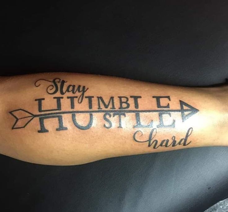 a person with a tattoo on their arm that says stay humble hustled hard