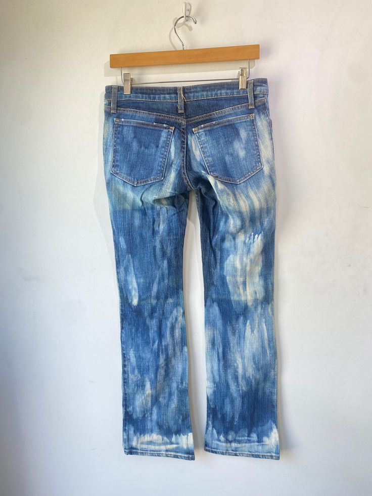 Built by Wendy Acid Wash Jeans! A fun denim piece in cotton blend with the perfect acid wash. Features a low-rise waist, zipper fly, and bootcut leg. Marked a size 28 and are in excellent condition! Approx. Measurements: Waist: 32" Rise: 6.5" Inseam: 32" Fitted Pre-washed Blue Jeans, Stonewashed Fitted Denim Bottoms, Fitted Stonewashed Denim Bottoms, Fitted Distressed Acid Wash Bottoms, Fitted Straight Leg Bleached Jeans, Fitted Faded Pre-washed Jeans, Fitted Cotton Stonewashed Bottoms, Faded Flare Fitted Jeans, Fitted Stonewashed Cotton Bottoms