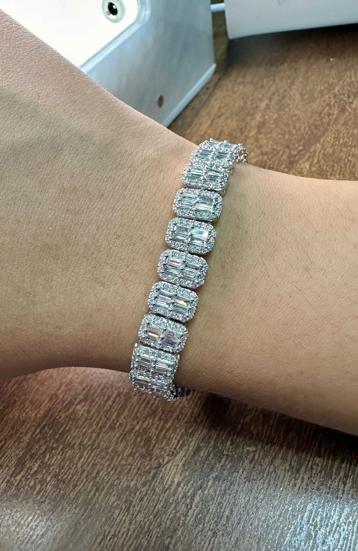 6.06 Carat Natural Diamond Bracelet F-G VS-SI 14K White Gold 100% Natural Diamonds, Not Enhanced in any way 6.06CT F-G VS-SI 14K White Gold, prong style, 15.72 grams 7 inches in length 9 mm in width, 3 mm in height B6065W ALL OUR ITEMS ARE AVAILABLE TO BE ORDERED IN 14K WHITE, ROSE OR YELLOW GOLD UPON REQUEST. All Chains of Pendants and Necklaces Can be Requested in 16'' or 18'' Length. . This item is proudly handcrafted in the USA. Perfect gift on any occasion. This Item has passed highest qual Silver Baguette Diamond Tennis Bracelet, Silver Rectangular Diamond Bracelet With 17 Jewels, Formal White Gold Tennis Bracelet With Rectangular Shape, Luxury Silver Rectangular Tennis Bracelet, Silver Bracelets With Baguette Diamonds For Anniversary, Formal White Gold Rectangular Tennis Bracelet, Rectangular White Gold Jubilee Tennis Bracelet, White Gold Rectangular Tennis Bracelet For Anniversary, Formal Rectangular White Gold Bracelets