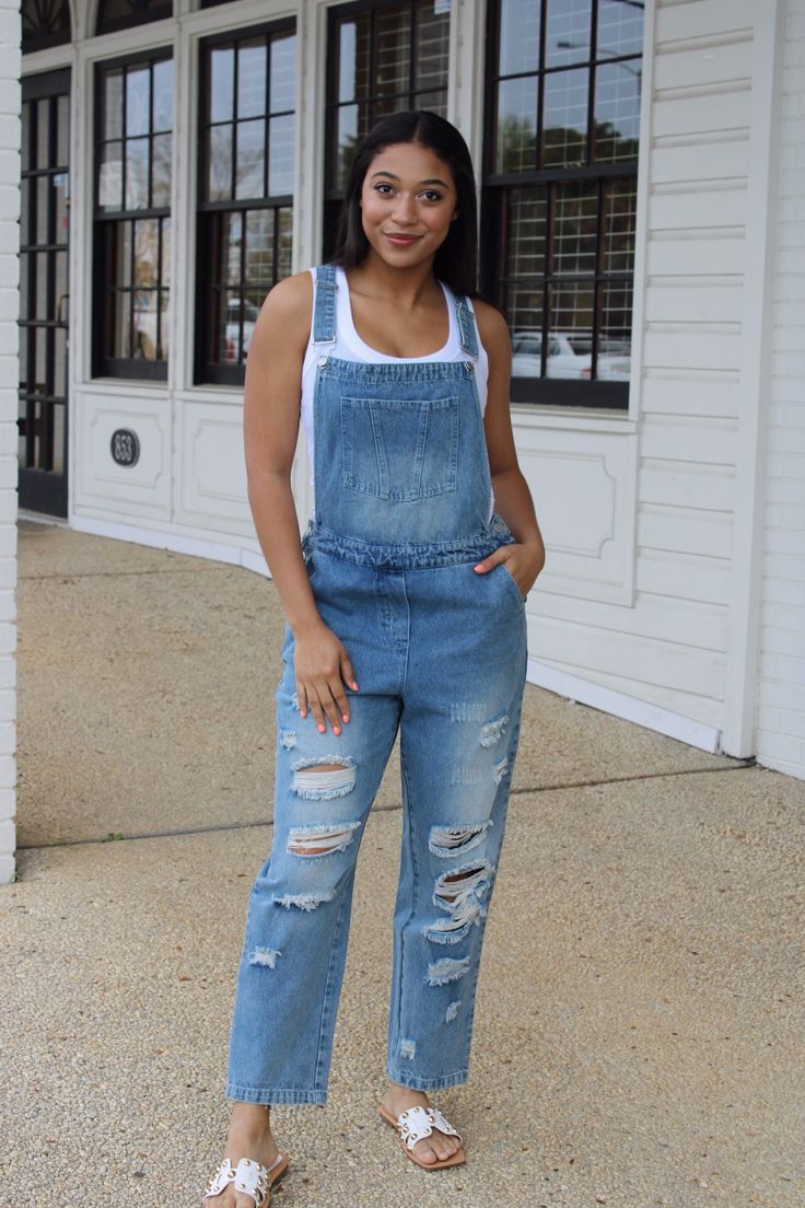 "Get ready to rock a cool, casual look with our Distressed Denim Overalls! The perfect mix of comfort and style, these overalls feature a loose fit and handy pocket for all your essentials. Say goodbye to boring outfits and hello to effortless cool. Denim never looked so good!" Boring Outfits, Cool Denim, Rock A, Denim Overalls, Say Goodbye, Distressed Denim, Casual Looks, Overalls, Loose Fitting