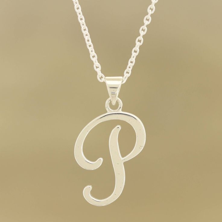 Dancing at the center of sterling cable chain, the cursive letter "P" is crafted from sterling silver with a high-polish finish that gleams in the light. Bhavesh presents this Indian monogram necklace, perfect for expressing your identity. India Dancing, Letter P, Necklace Craft, Monogram Necklace, Stacked Jewelry, Earring Crafts, Sterling Silver Necklace Pendants, Silver Pendant Necklace, Jewelry Gift Box