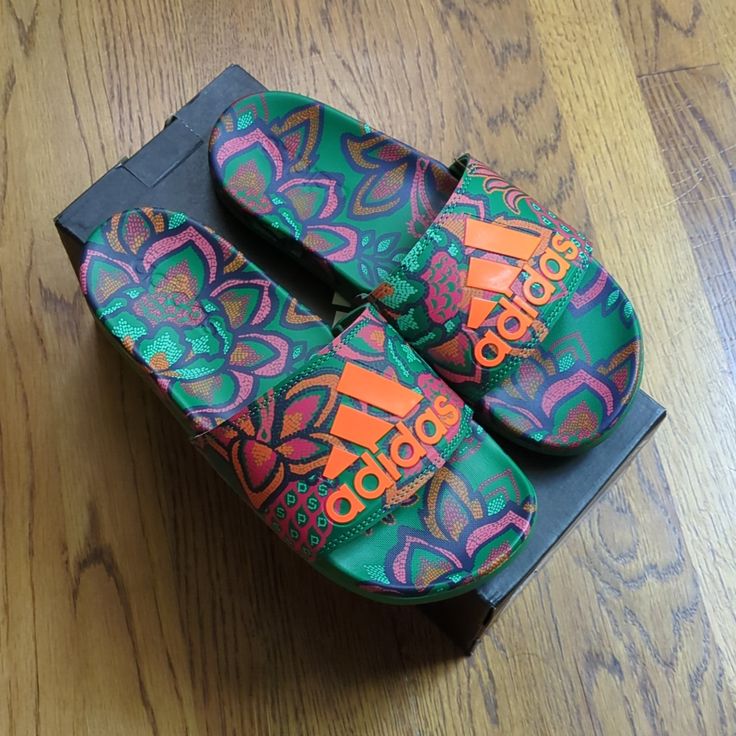 Nib Farm Rio Slide Sandals Adidas Collaboration Women's Size 6 Green Abstract Floral Print. There's Only Adidas Branding On The Box But It Is A Farm Rio Collaboration. True To Size. Channel The Energy Of Brazil's Iconic Beaches. These Slides Have Graphics That Were Created In Collaboration With Farm Rio. The Lightweight Cushioning Soothes Deserving Feet After Long Days On The Go. The Classic Adidas Look Signals Your Commitment To Sport And Comfort. New To Poshmark? Use The Sign Up Code: Greenegg Orange Flat Flip Flops For Summer, Orange Flat Slides For Spring, Summer Orange Flat Flip Flops, Orange Synthetic Flip Flops, Casual Orange Slides For Spring, Orange Summer Flip Flops, Orange Round Toe Slides For Summer, Orange Flat Flip Flops Casual Style, Orange Flat Synthetic Sandals