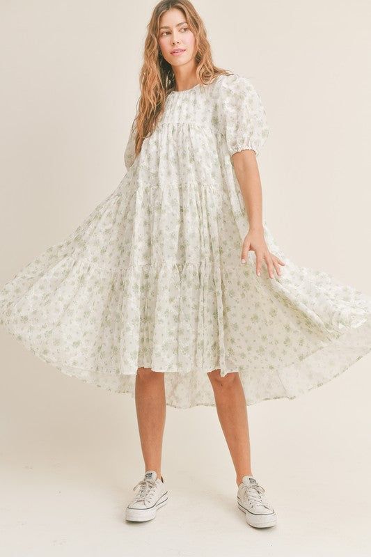 Floral Textured Dress Tiered Ruffle Shape Back Tie Closure Side Pockets 80% Polyester, 20% Nylon Spring Tiered Midi Dress For Garden Party, Billowy Dress For Spring Garden Party, Midi Length Tiered Dress For Garden Party, Spring Billowy Dress For Garden Party, Billowy Spring Garden Party Dress, Breezy Midi Dress For Spring Garden Party, Tiered Skirt Dress With Ruffle Hem For Garden Party, Tiered Ruffle Hem Dress For Garden Party, Tiered Skirt Dress With Layered Hem For Garden Party