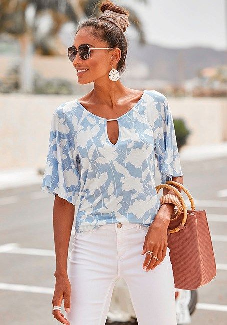 Stay on-trend in this beautiful top with a deep keyhole neckline and stylish print. Chic Floral Print Top With Split Neck, Trendy Split Neck Summer Tops, Trendy Summer Split Neck Tops, Trendy Split Neck Tops For Summer, Blue Printed Split Neck Tops, Chic Blue Split Neck Blouse, Chic Split Neck Top For Vacation, Summer Split Neck Top For Day Out, Chic Split Neck Tops For The Beach