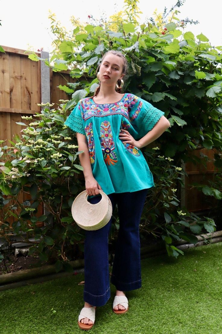 Handmade Chanelito Top - Extra Large /UK16 Measurements: 73cm/28inch Long  breast armpit to armpit 57cm/22.5inch Colour: Turquoise Model Size: Medium / 8 UK Model height: 5'6 This lovely Mexican floral design blouse has been hand-embroidered, ideal at any time of the year perfect for a romantic date, picnic, Mexican Party, Catrina costume or any occasion, This beautiful top is made 100% cotton, made in Puebla, Mexico. Features: Handmade with Love: Each Chanelito top is meticulously crafted by sk Bohemian Green Blouse With Floral Embroidery, Green Summer Blouse With Embroidered Hem, Green Embroidered Top For Summer, Bohemian Green Top With Intricate Embroidery, Green Bohemian Top With Intricate Embroidery, Bohemian Green Tops With Intricate Embroidery, Green Bohemian Tops With Intricate Embroidery, Green Blouse With Embroidered Hem For Summer, Green Embroidered Bohemian Blouse