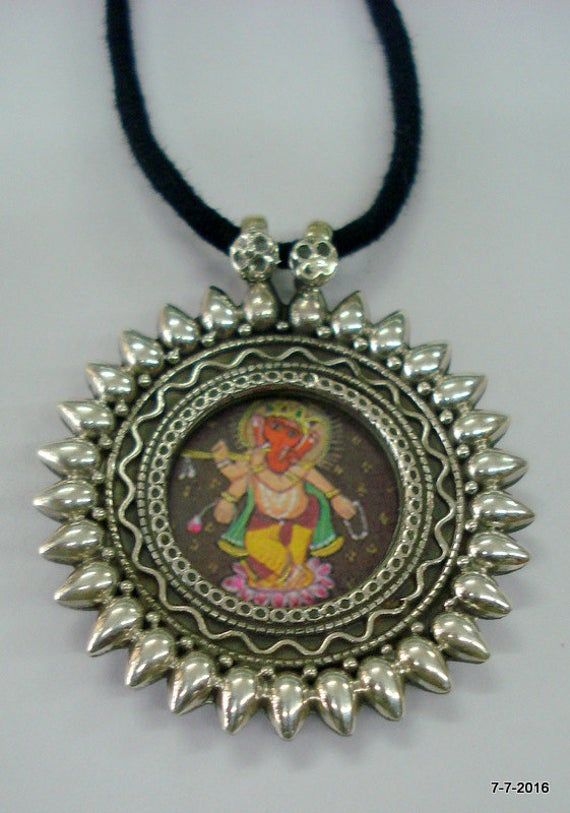 "Traditional Design Sterling Silver Pendant Necklace From Rajasthan India. Great Handmade Design, Good For Jewellery Collection. Note - Please check pictures carefully for more detail. Hindu God Lord Ganesha Painting. height max.. - 5.3 cm(2\") width max.. - 4.5 cm(1.8\") weight - 18 grams material - 925 sterling silver." Navratri Themed Motif Jewelry Gift, Round Temple Jewelry With Motifs, Temple Jewelry With Round Motifs, Handmade Round Pendant Jewelry For Festivals, Silver Jewelry With Artistic Design For Festive Occasions, Festive Silver Jewelry With Artistic Design, Traditional Handmade Jewelry With Round Pendant, Traditional Handmade Round Pendant Jewelry, Traditional Temple Necklace With Motifs As Gift