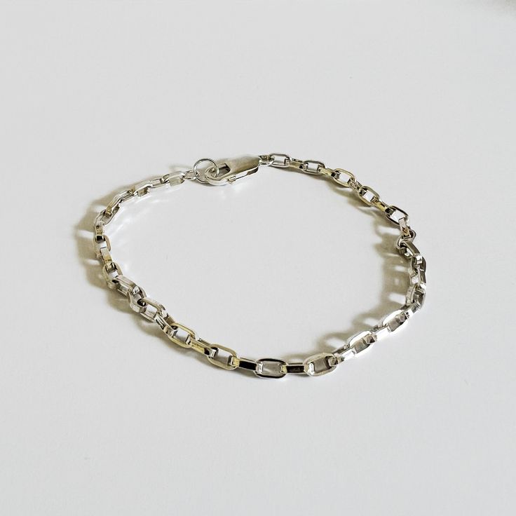 metrix jewelry chunky chain bracelet in sterling silver Silver Chain Bracelet, How To Make Shorts, Sterling Silver Chain, Sterling Silver Chains, Chain Bracelet, Lobster Clasp, Silver Chain, Handmade Jewelry, Bracelet