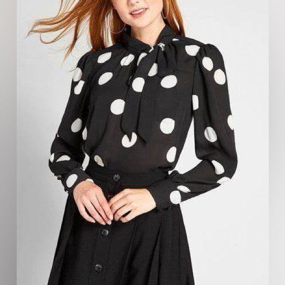 Modcloth Black Polka Dot Marvel The Masses Blouse Nwt Size S Side Keyhole And Tie Neckline. 3 Button Cuffs. Pleated Shoulders. One Dot Has Slight Pull, See Last Pic. Armpit To Armpit 18.5” Backdrop 25” Bin 19 Black Polka Dot, Polka Dot, Polka Dots, Dots, Blouses, Womens Tops, Black White, Marvel, Hairstyles