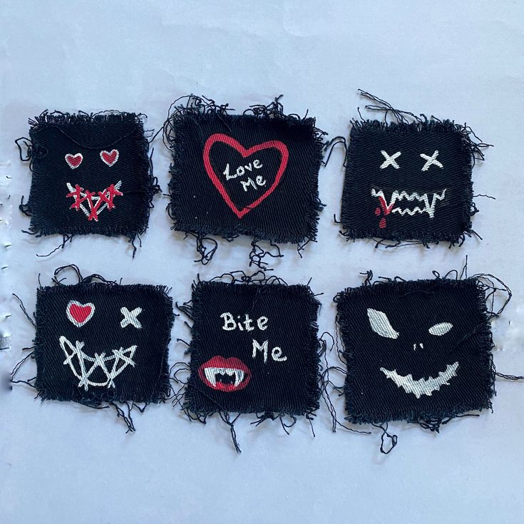 six embroidered patches with different designs on them