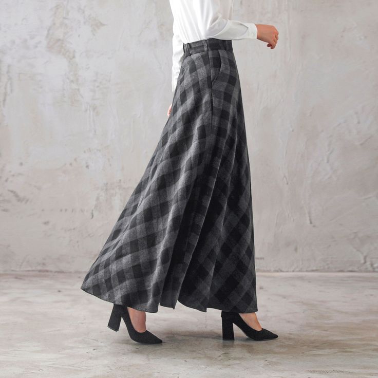 "This winter wool skirt is a classic piece of tailoring that will see you through rain or shine. It is cut with a flattering flared skirt to give you a wonderful shape. The winter skirt is perfect classic styling and ends at the ankle. This is a versatile skirt that you'll wear again and again. DETAILS: * More colors available https://etsy.me/2WgHgmy * 30% wool, 30% fiber, 40% polyester * fully satiny liner * Two side pockets * Right zip closure * has belt loops to keep everything in place AND * Classic High Waist Skirt For Fall, Classic High-waist Skirt For Fall, Winter Full-length Pleated Skirt, Elegant Plaid Skirt, Fitted Wool Full Maxi Skirt, Wool Pleated Long Skirt, Plaid A-line Skirt With Lining, Winter Full Length Lined Skirt, Full Length Lined Skirt For Winter