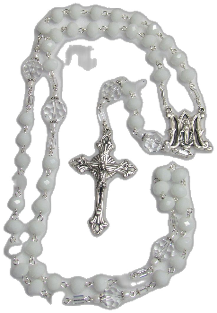 Silver Beaded Rosary For First Communion, Silver Faceted Beads Rosary Cross, White Spiritual Crucifix Jewelry, Spiritual White Crucifix Jewelry, White Beaded Cross Rosary, White Cross Jewelry With Miraculous Medal, White Beaded Cross-shaped Rosary, White Beaded Rosary With Round Beads, Silver Rosary With Faceted Beads