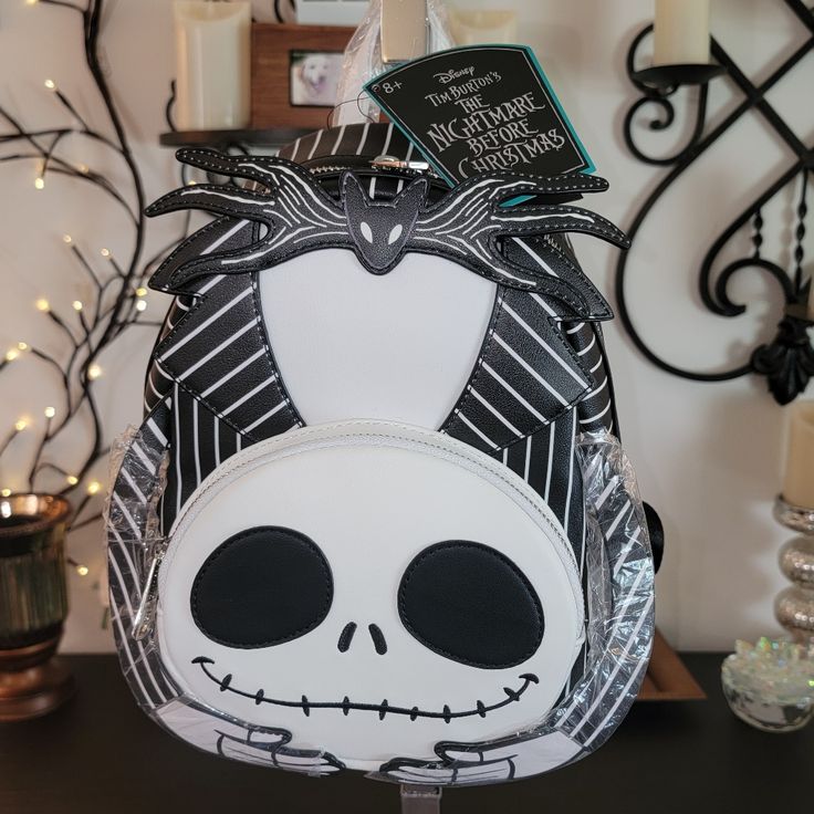 Loungefly Disney Nightmare Before Christmas Headless Jack Skellington Mini Double Shoulder Strap Backpack Purse, Nwt. Officially Licensed Disney Faux Leather Featuring Front Zipper Pocket, Inside Zipper Pocket, Full Zippered Top, Adjustable Shoulder Straps, Top Carry Handle And Printed Inside Lining. Approx Measurements 9" W X 10.5" H X 4.5" D, Straps Will Vary As They Are Adjustable. White Halloween Backpack For Travel, White Halloween-themed Travel Backpack, White Backpack For Halloween, Halloween White Backpack, White Halloween Backpack, Themed White Backpack For Everyday Use, Nightmare Before Christmas Wallpaper, Disney Nightmare Before Christmas, Disney Bags