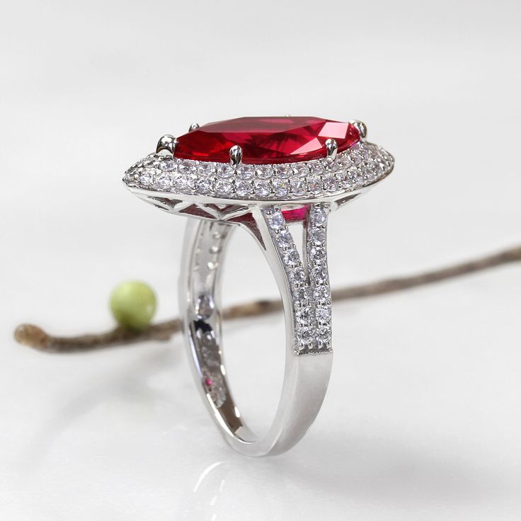 This beautiful Platinum Plated Sterling Silver Ring 3.8 carat Marquise Simulated Ruby CZ Stone Art Deco Ladies Cocktail Ring ( Size 5 to 9 ) is meticulously crafted in gleaming and durable Sterling Silver. Our stones are the highest quality diamond simulant that are polished, finely cut, loupe clean, and have an exactly similar appearance and as beautiful as to naturally occurring diamonds. All cubic zirconia stone weights are approximate and listed as diamond equivalent weight in carats. Our cl Ring Marquise, Marquise Ring, Cz Rings Engagement, Silver Wedding Bands, Wedding Engagement Ring, Gold And Silver Rings, Statement Ring Silver, Diamond Simulant, Ruby Ring