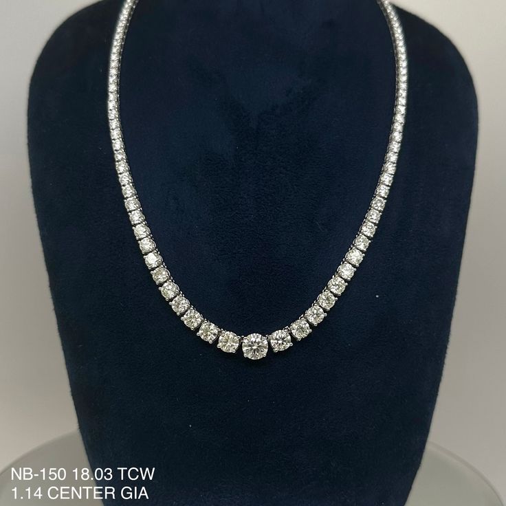 This 18.03 Cts. Natural Round Riviera Necklace boasts a unique combination of elegance and sophistication with its 18K white gold construction and a stunning round-cut center diamond. It is the perfect piece to elevate any look. Get ready to make a statement with this luxurious necklace. CENTER 1.14 RD J VS1 GIA 2457564225SIDE 0.60 RD J VS2 GIA 5453358981 & 0.60 J VS2 RD GIA 5453445943DIAMOND 15.69 RD TCW 112 PCS. H-J VS1-VS218K WG 22.84 GRAMS SIZE 16.50" NB-150 Luxury Platinum Necklaces With Diamond Accents, Luxury Platinum Diamond Necklace With 17 Jewels, Elegant Lab Grown Diamond Necklace With Brilliant Cut, Elegant Brilliant Cut Lab Grown Diamond Necklace, Classic Formal Tennis Necklace With Lab Grown Diamonds, Classic Formal Tennis Necklace With Lab-grown Diamonds, Round Cut Moissanite Tennis Necklace In White Gold, Timeless Moissanite Formal Necklaces, Timeless Moissanite Necklaces For Formal Occasions